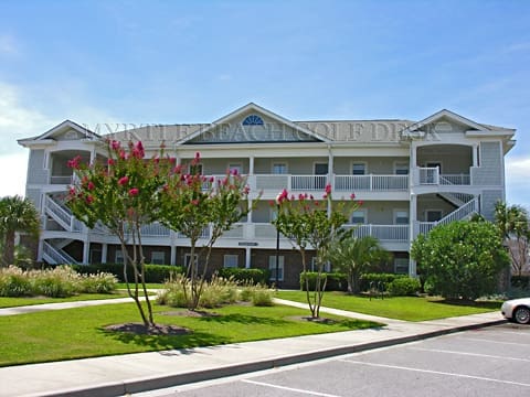 Residential complex with green lawn