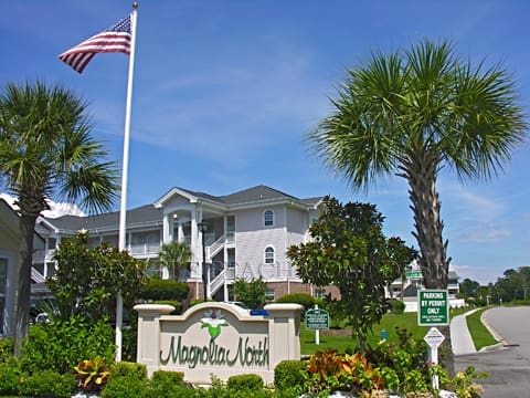 Magnolia North entrance with palm trees